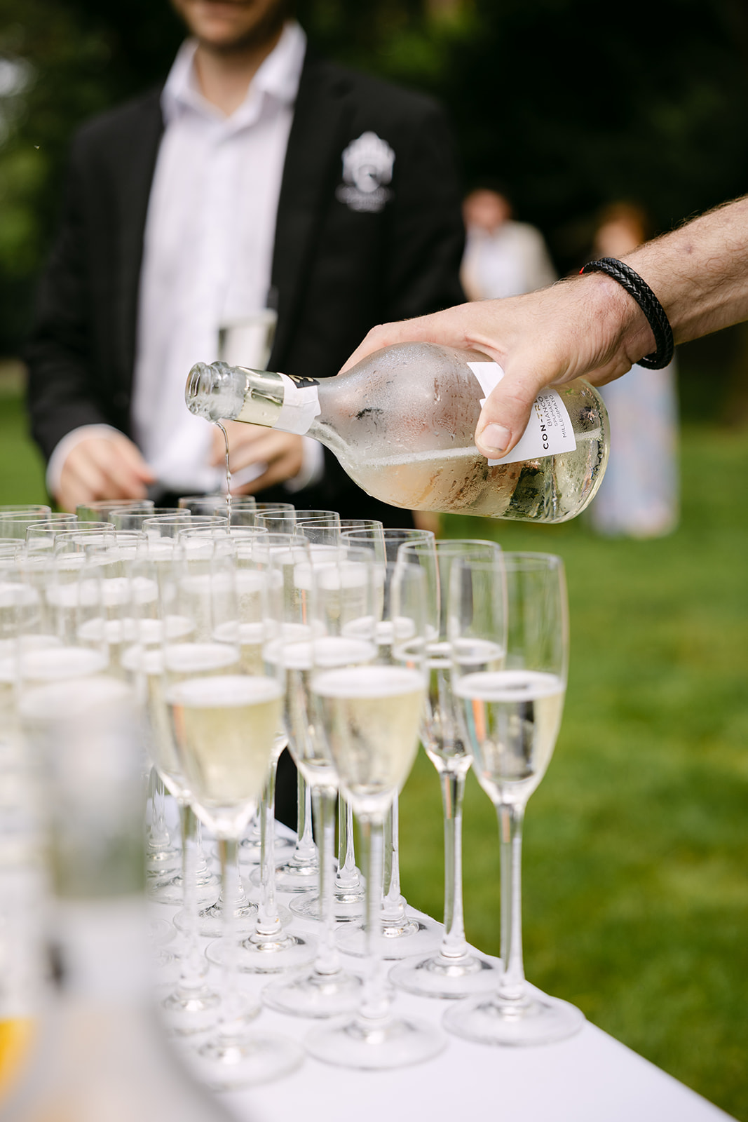 Sparkling wine being poured during the reception