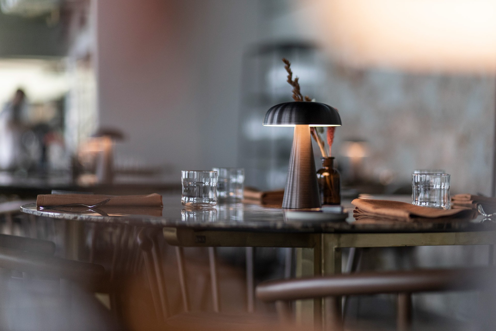 Attractively set table at restaurant Bink