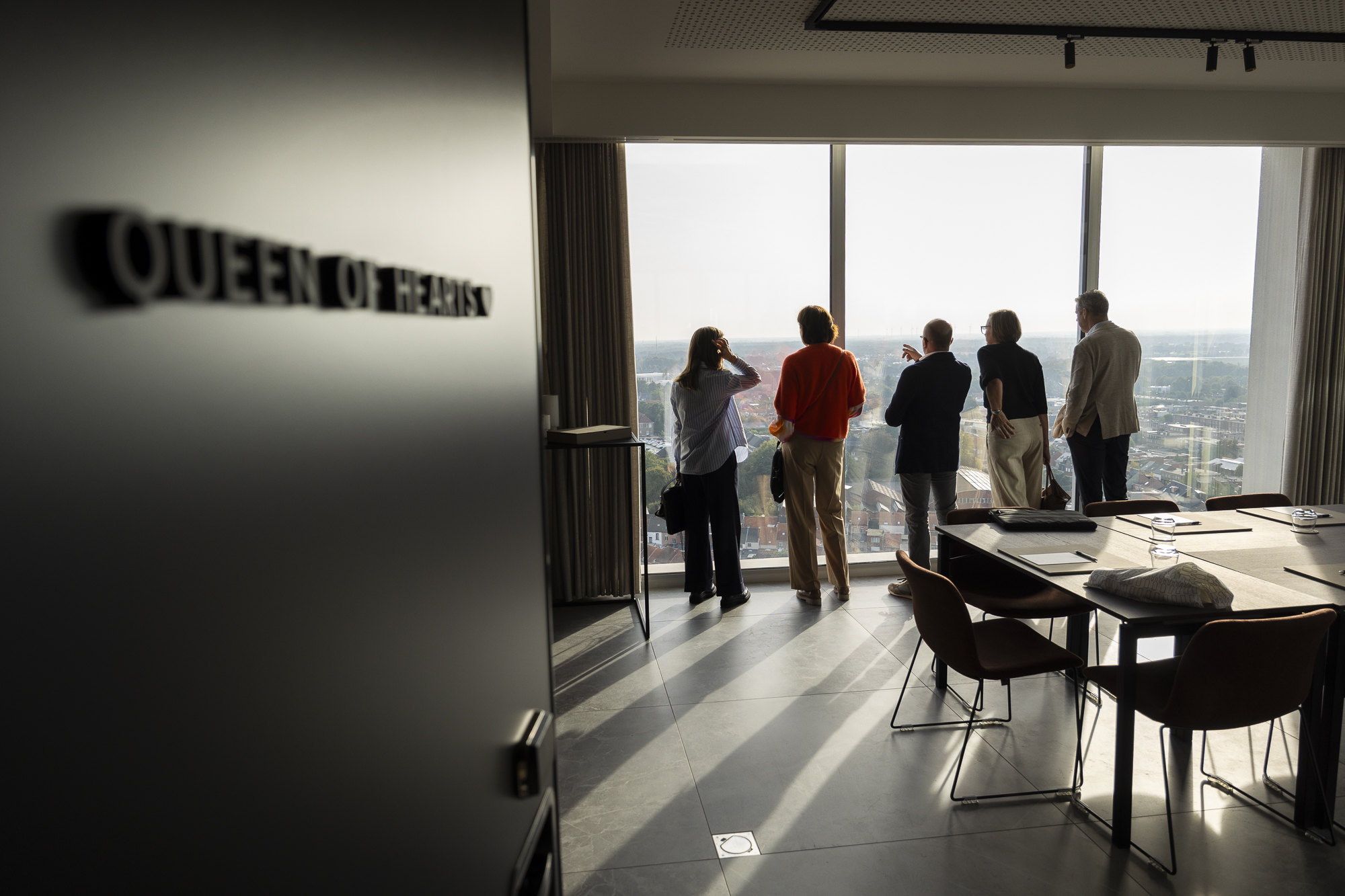 Guests looking out over Turnhout from the Queen of Hearts meeting room at Sky Venue