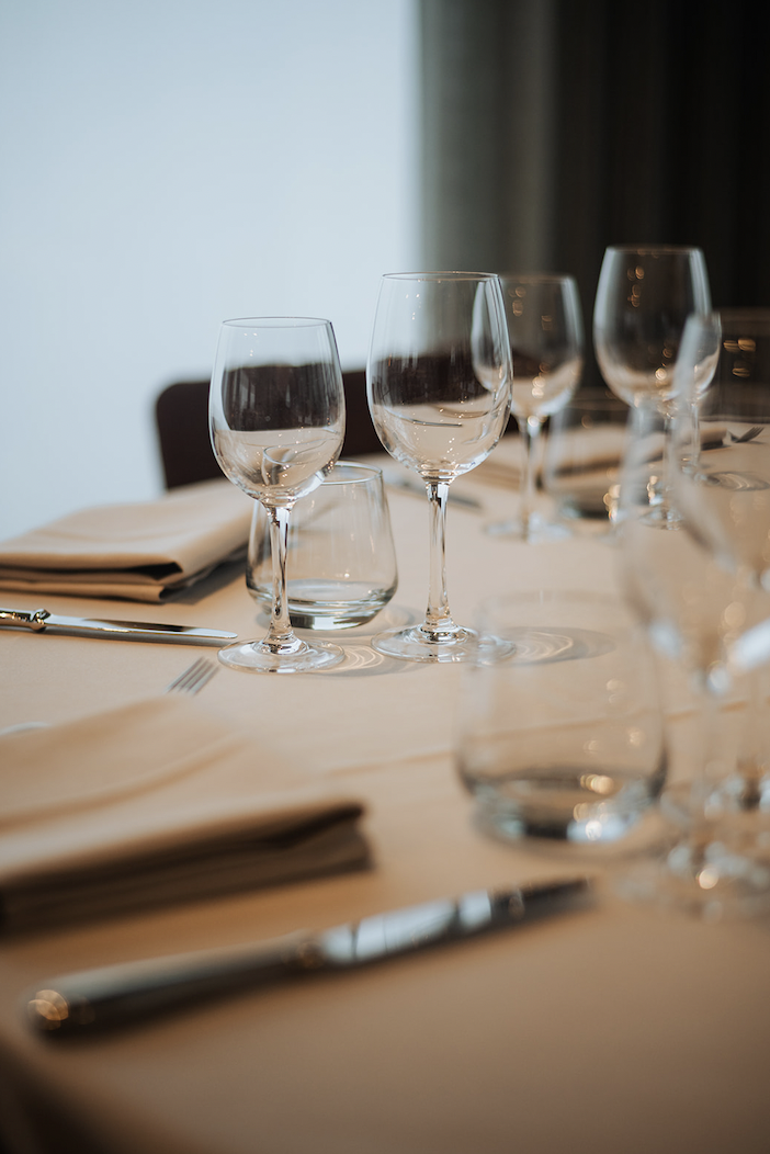 Refined table with wine glasses at Sky Venue