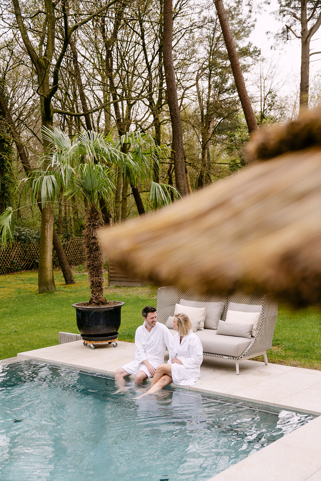 Relaxing in a robe beside the Wellness Namasté outdoor pool