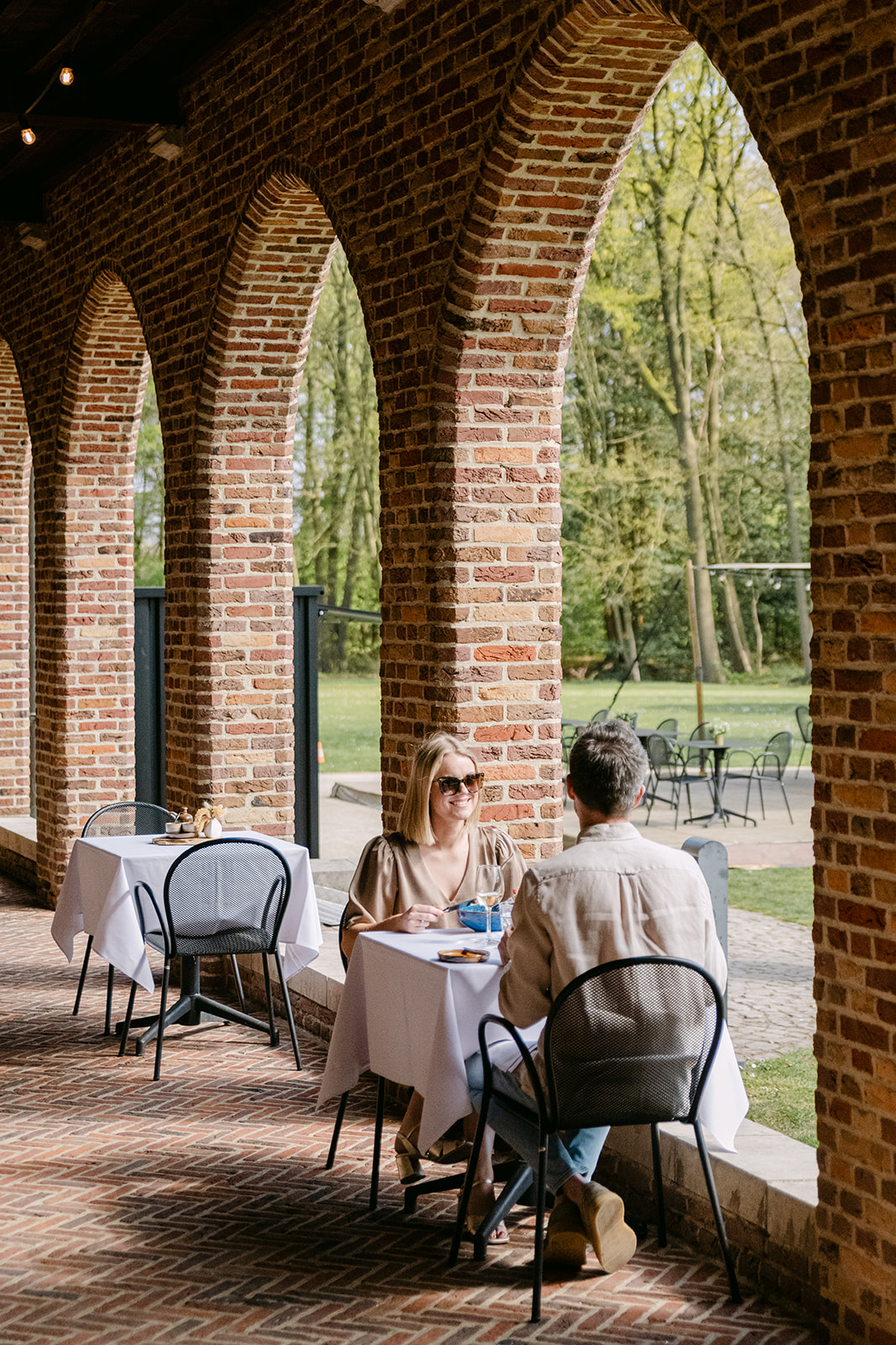 Festively laid tables in the open building