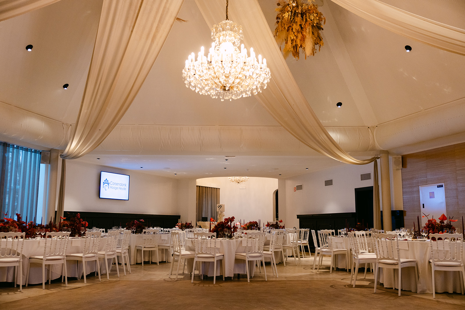 Banquet hall with chandelier in evening light