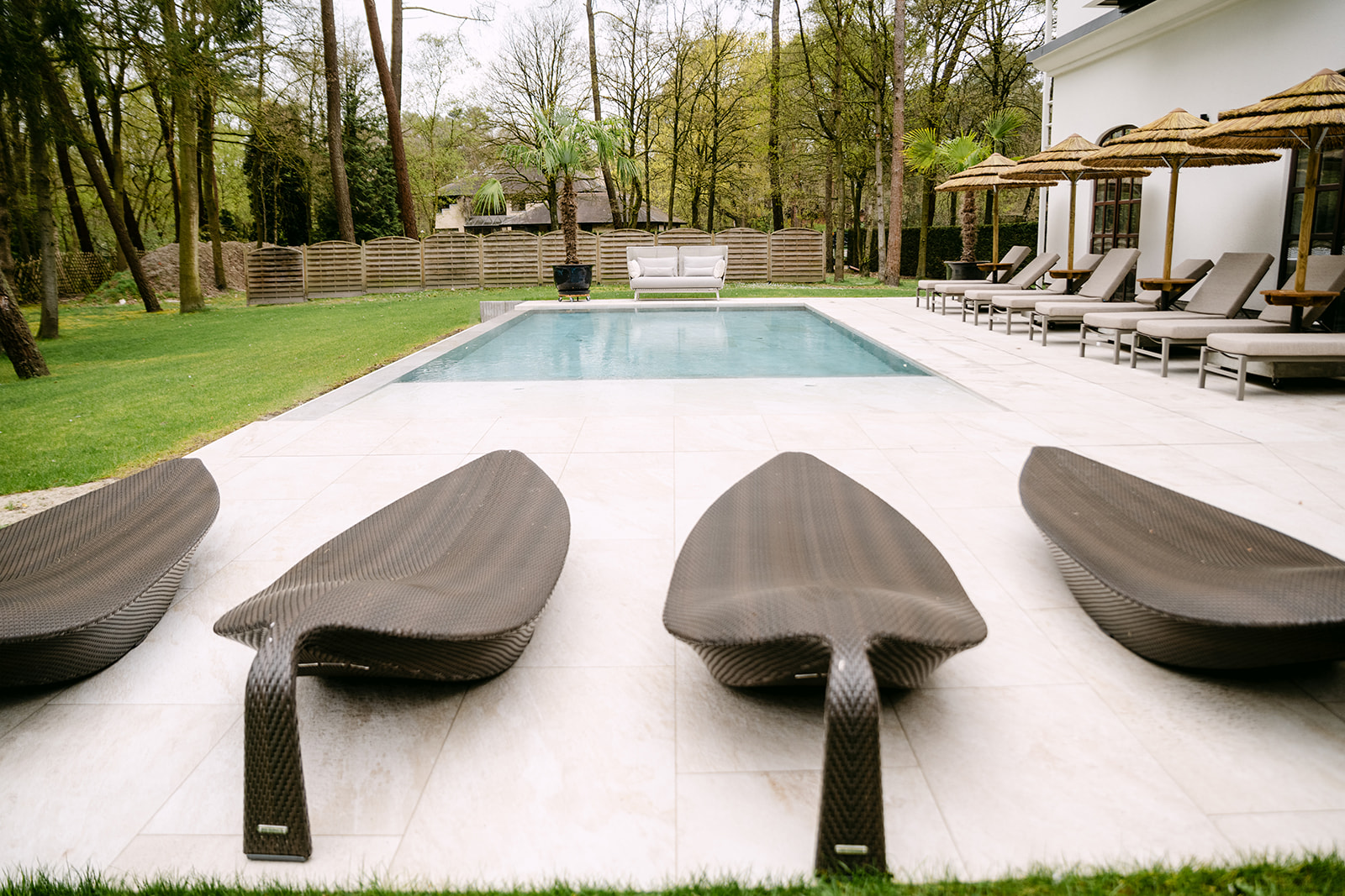 Outdoor pool and loungers at Wellness Namasté