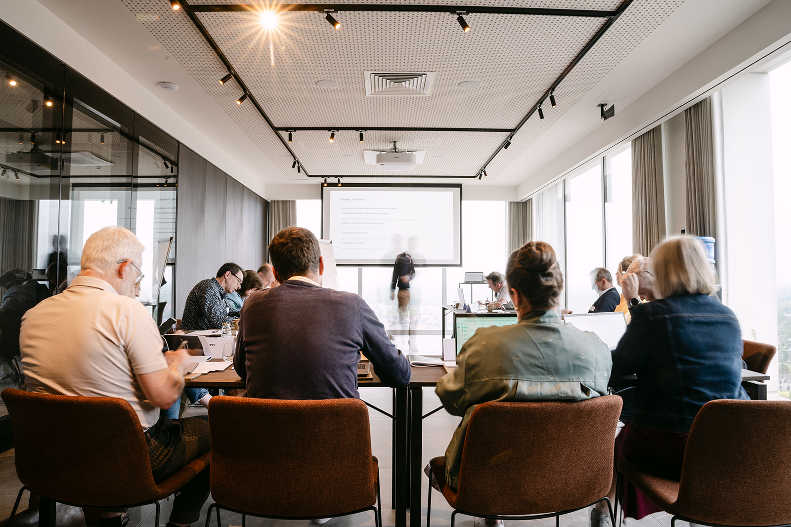 Participants during a workshop in a meeting room at Sky Venue