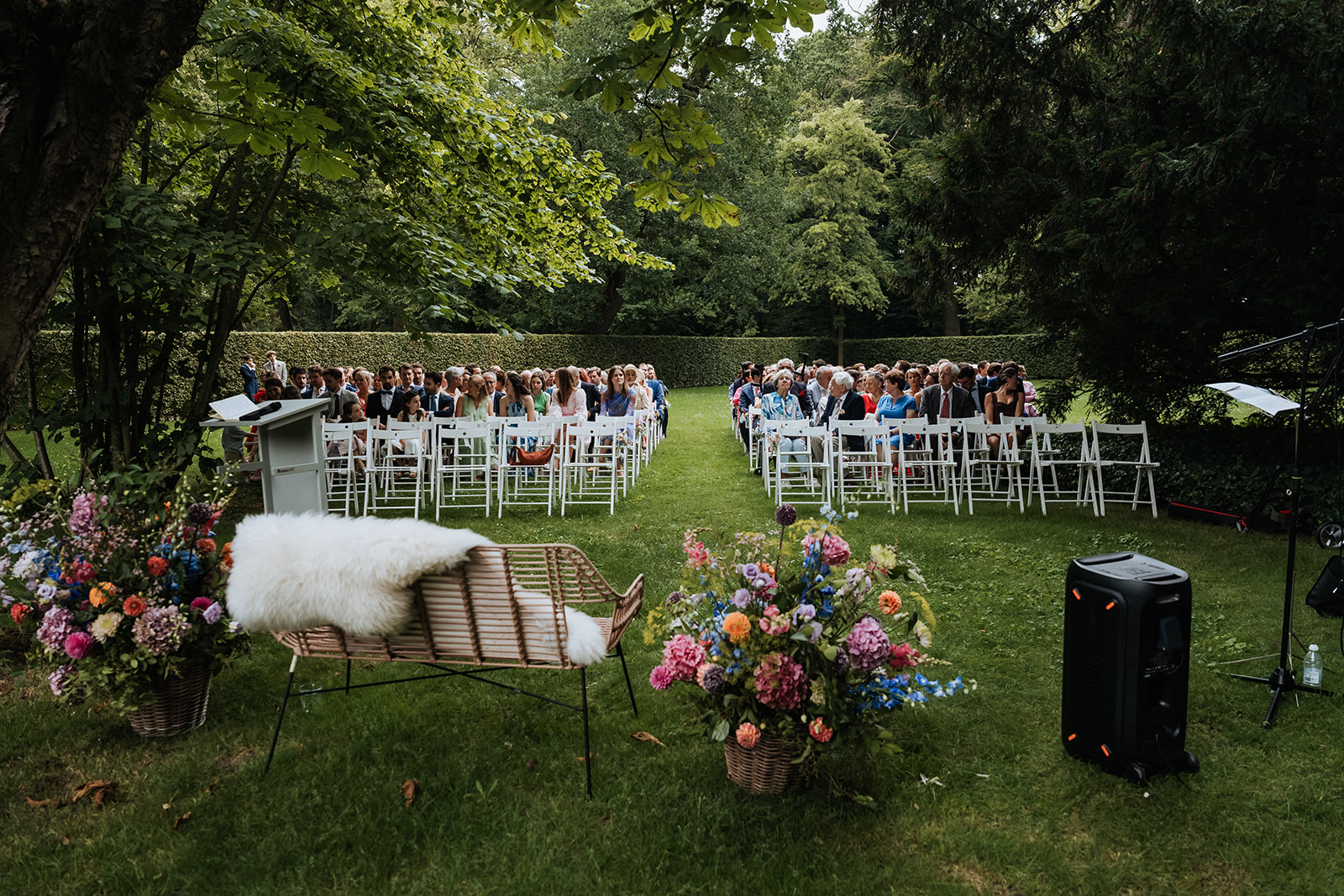 Outdoor ceremony in the garden with flowers